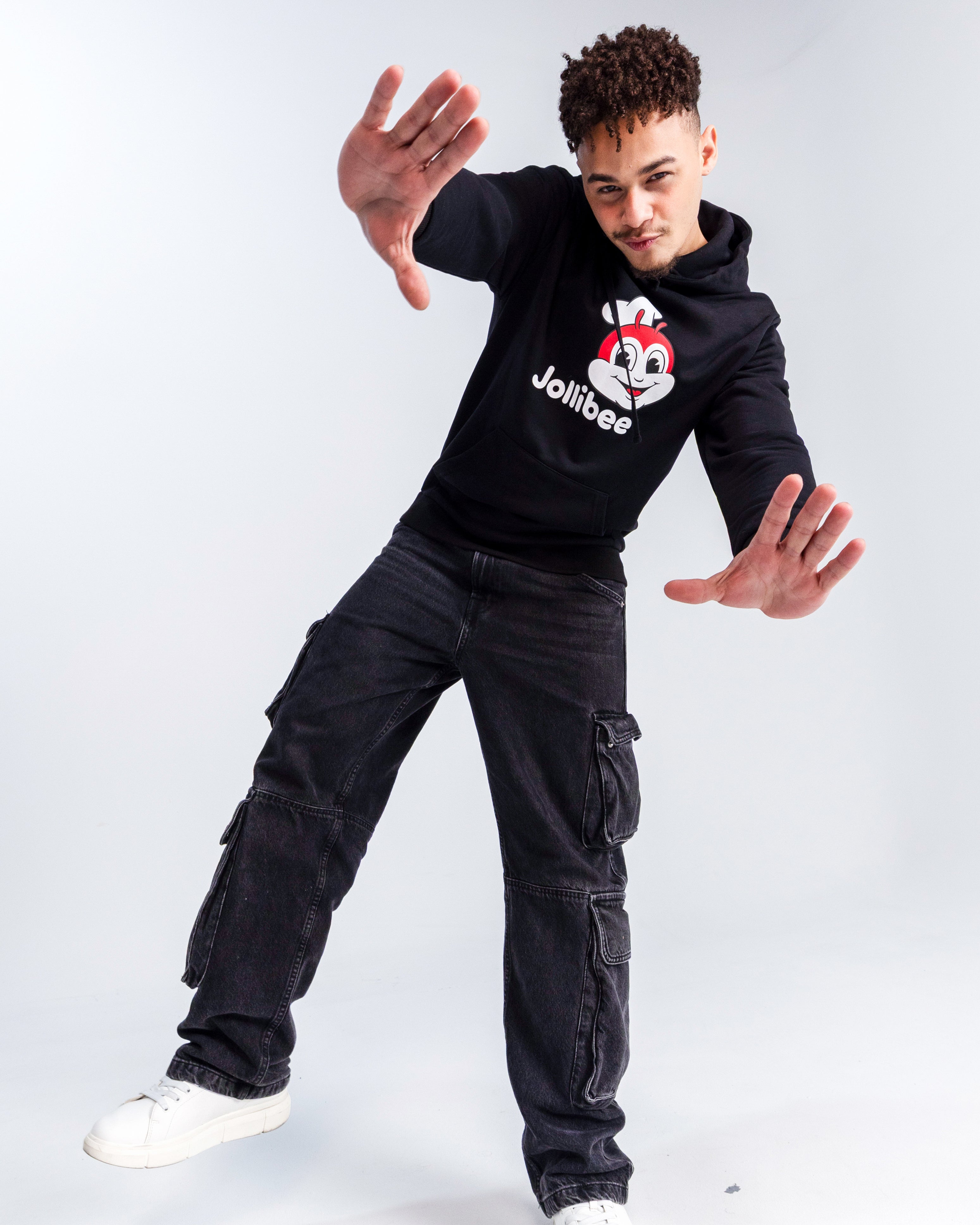 guy wearing Jollibee merch classic black hoodie