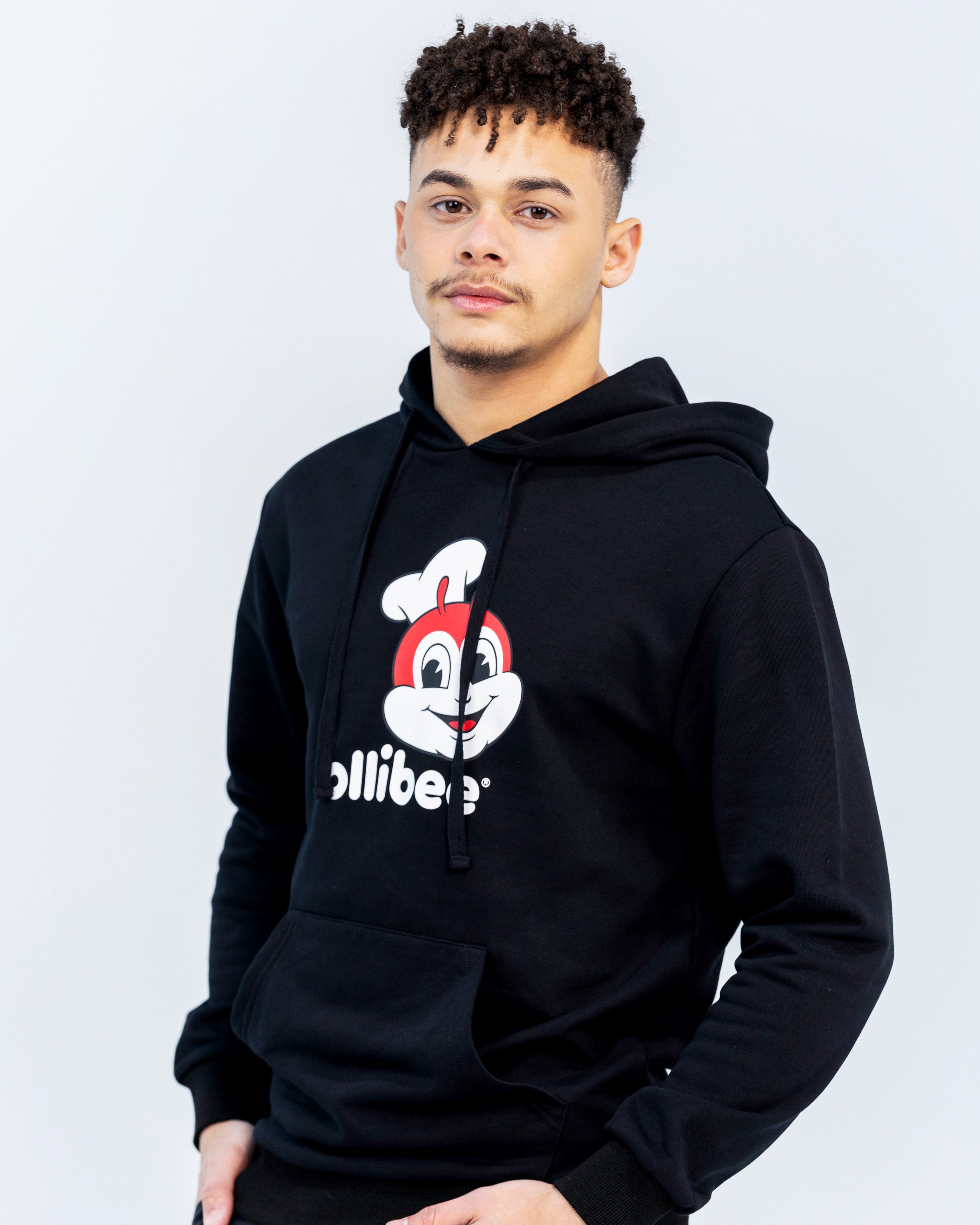 guy wearing Jollibee merch classic black hoodie