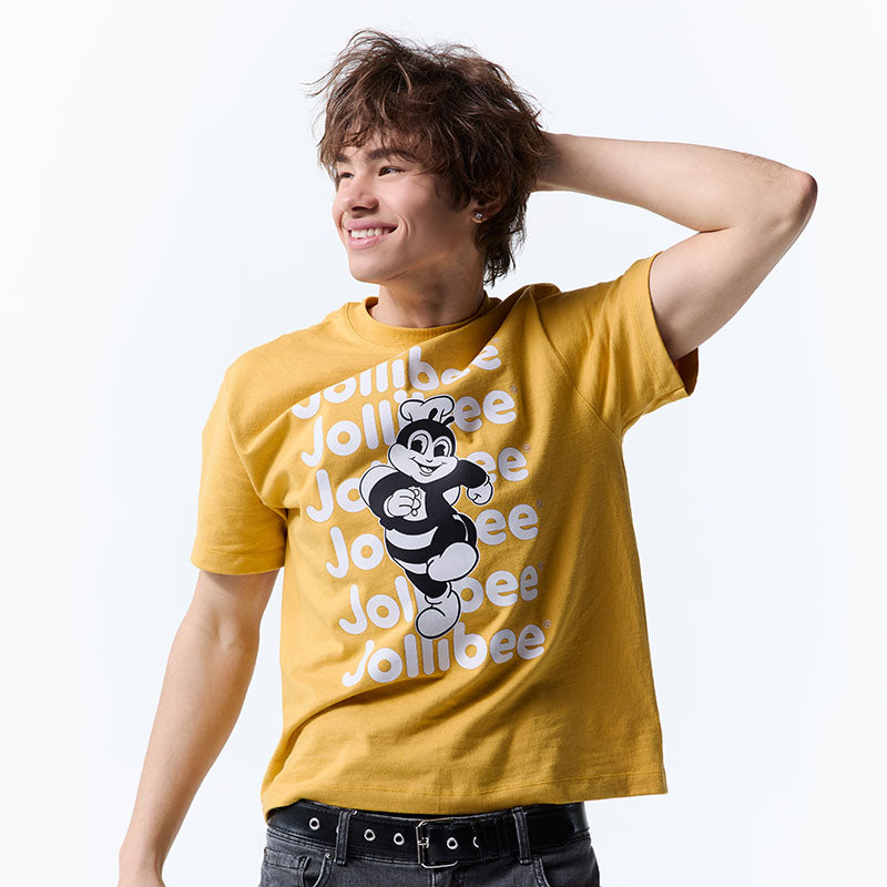 Person wearing a yellow t-shirt with Jollibee running and text on a white background