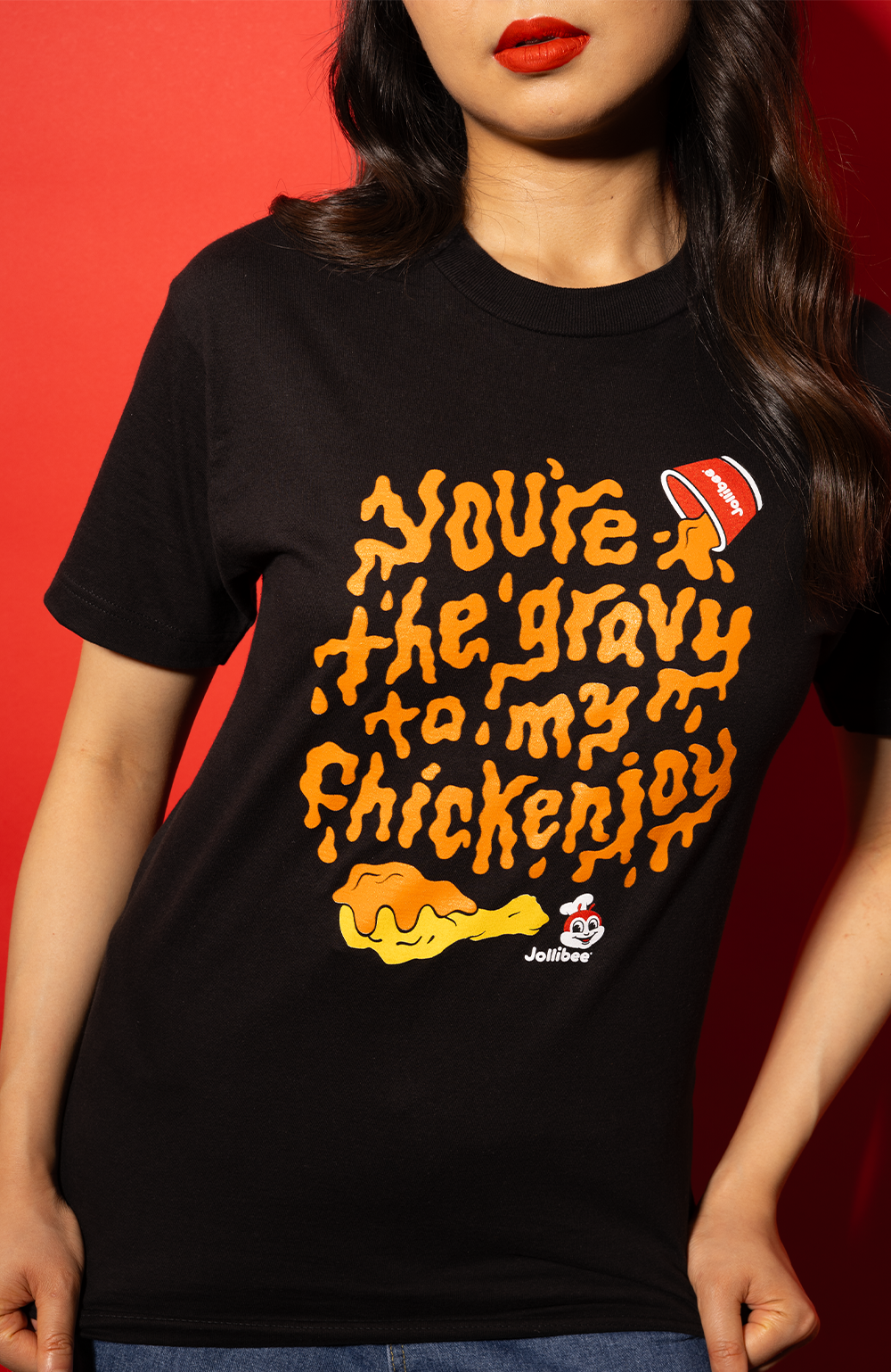 young woman wearing Jollibee Black Gravy T-Shirt