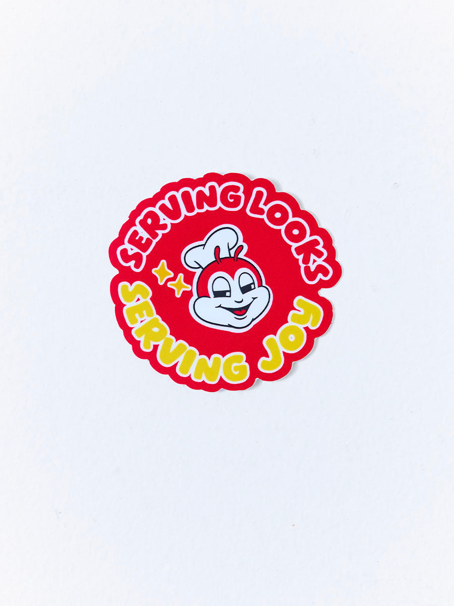 Circular logo with Jollibee mascot and text 'Serving Looks Serving Joy' on a white background